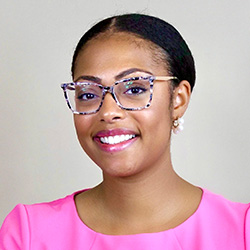 Dominique Veasey-Hall, programs associate director, headshot
