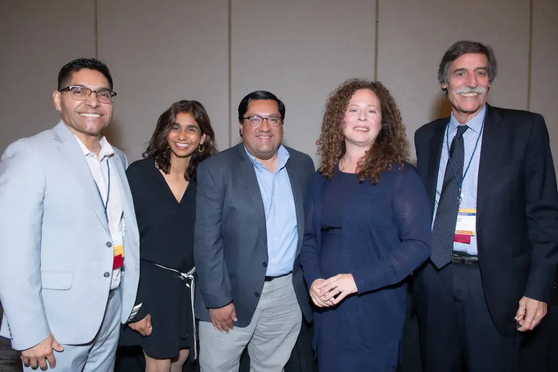 Five people in business attire