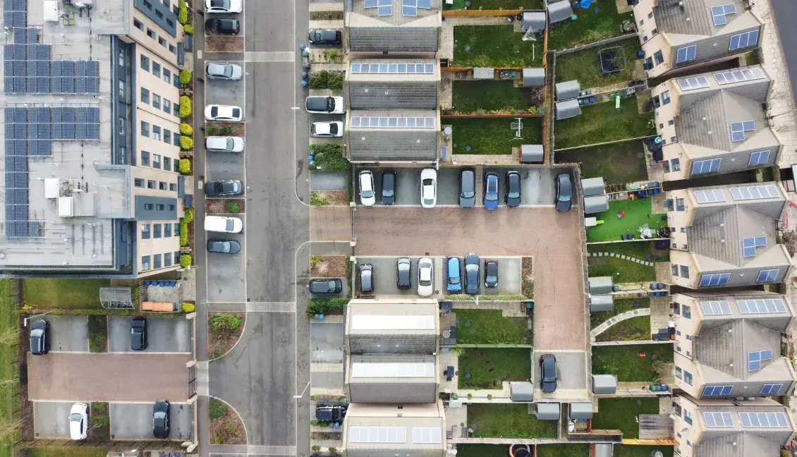 Aerial view of community with solar panels