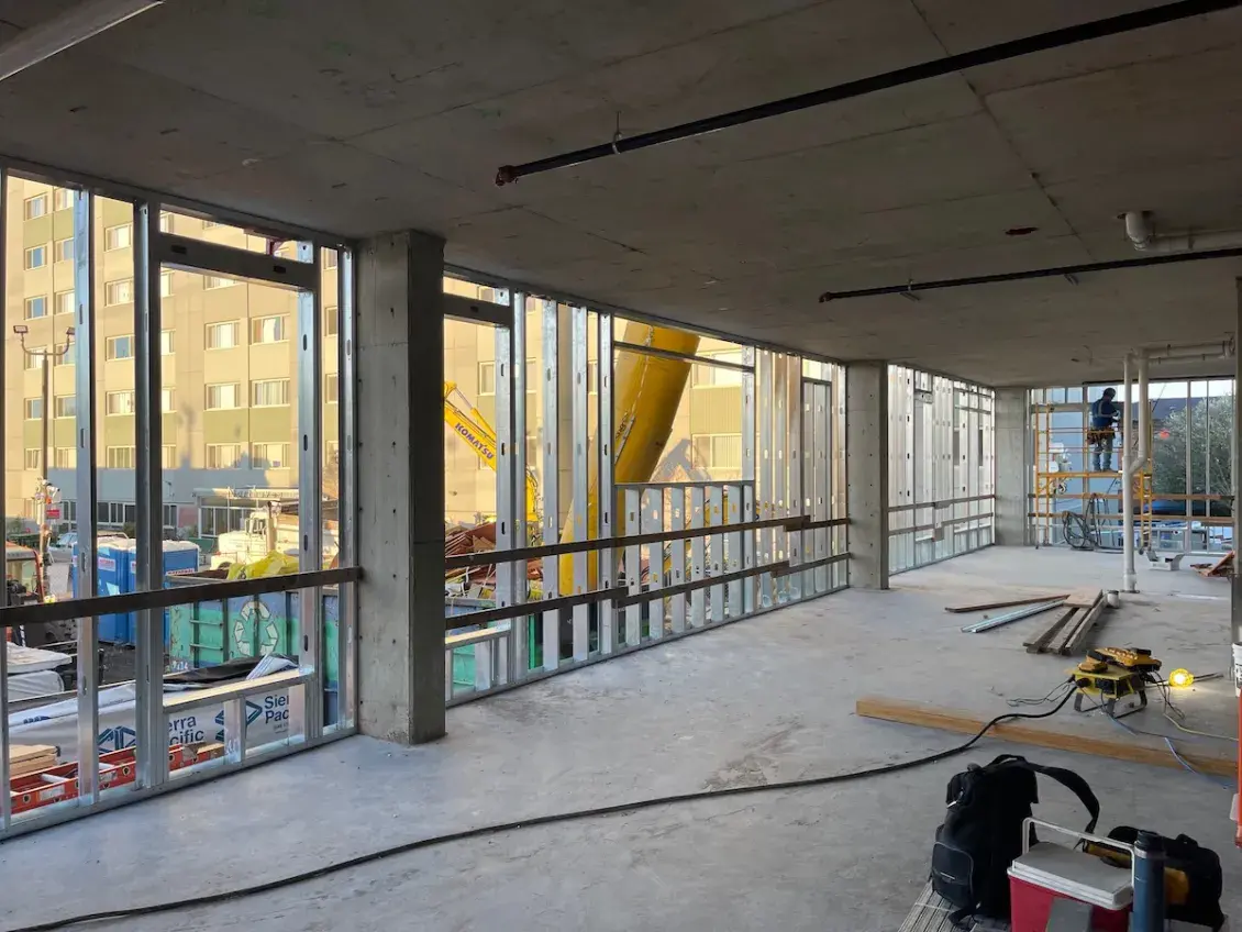 Construction Worker Framing Early Learning Center Space
