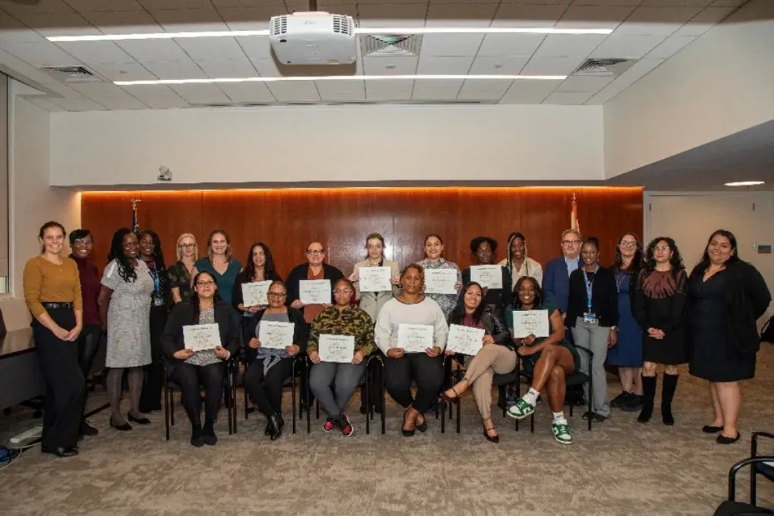 Housing Career Pathways trainees from Cohort Seven celebrate graduation with program partners.