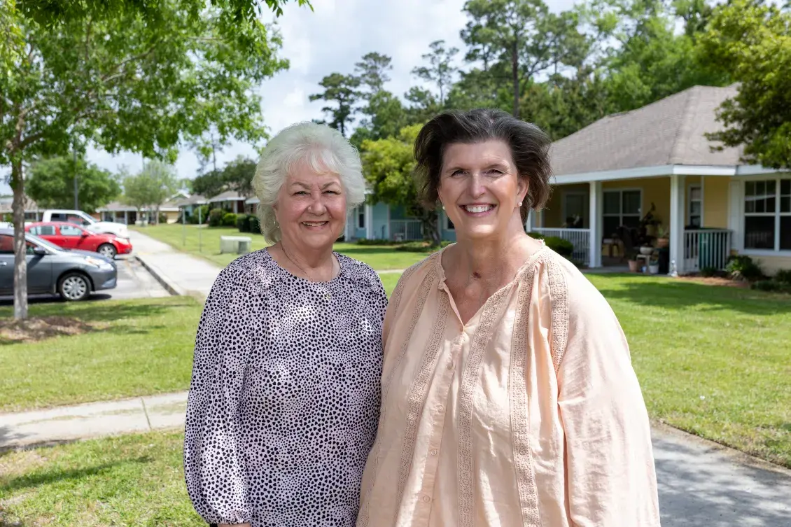 Karen Ladner and Janine Lee, former and current exec directors of the Bay Waveland Housing Authority