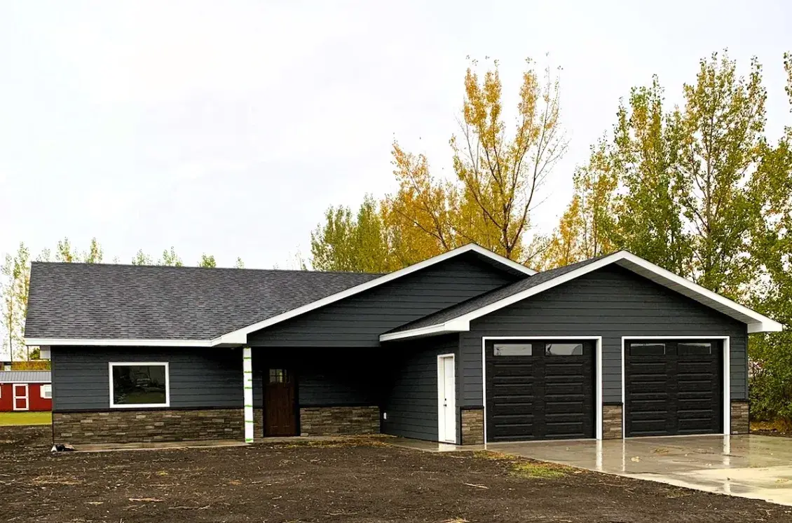 Grayish single-story, family home under construction