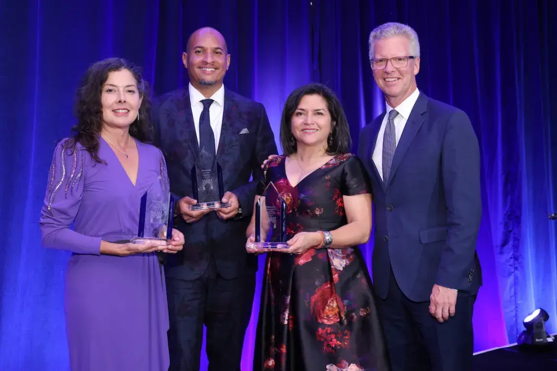 Southland Social Honorees Holding Awards with Enterprise CEO