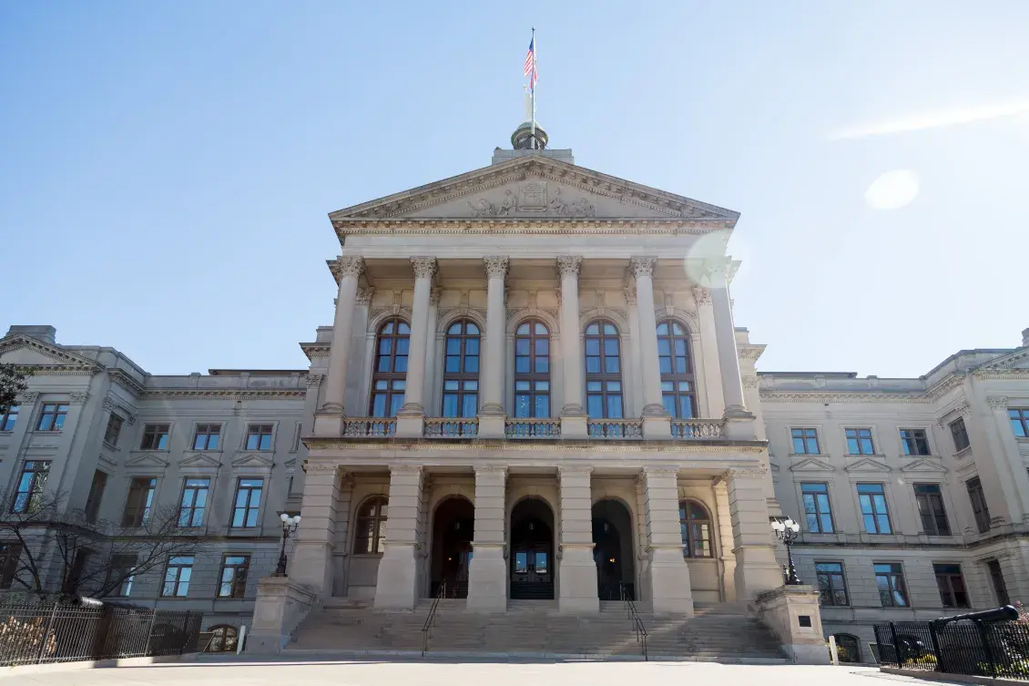 Skyward view of the Georgia State Capitol front entrance 