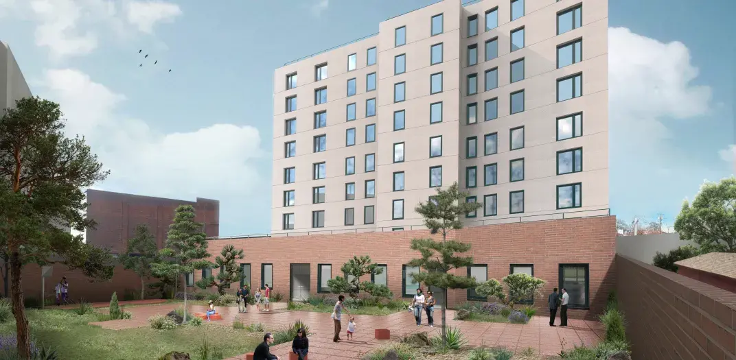 A rendering showing Green Communities certified multifamily affordable housing under development with residents shown enjoying the property's courtyard. 