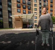 Resident in front of The Overlook at Oxon Run in Washington, D.C.