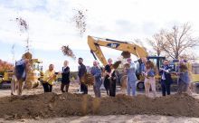 Enterprise Community Development, city and state leaders with shovels at the groundbreaking ceremony