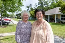 Karen Ladner and Janine Lee, former and current exec directors of the Bay Waveland Housing Authority