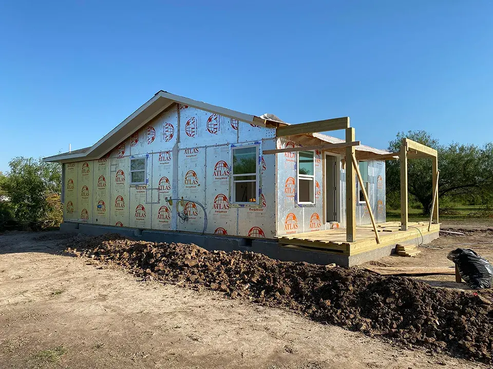 The structure of a home being built outside