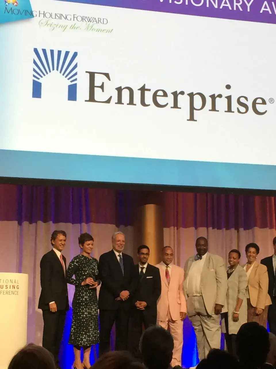 Michelle Whetten accepting award from Rick Lazio