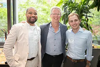 Gotham members, Tahir Alberga (left) and Michael Shaid (right) with Shaun Donovan, Enterprise CEO