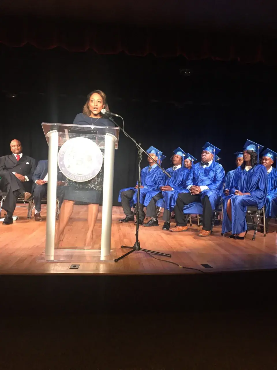 Rachelle Defillo speaking at graduation