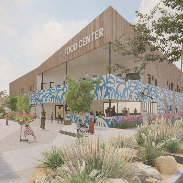 Architectural rendering of a building with a sign that reads "Food Center" with outdoor seating and desert landscaping