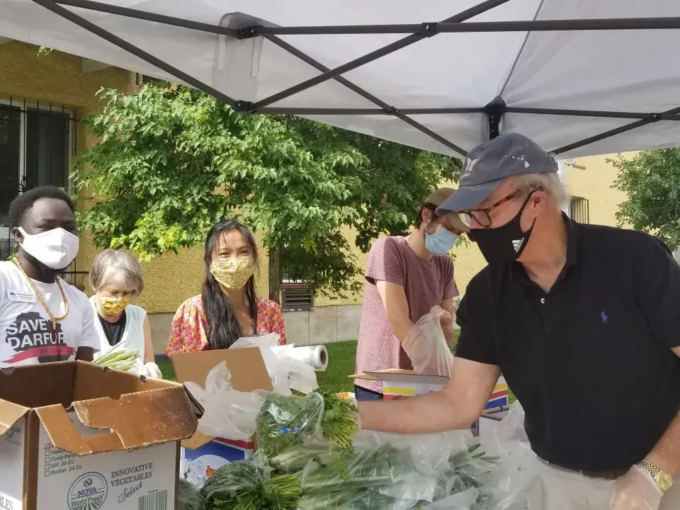 Hope Communities staff holds a food drive for residents during Covid.