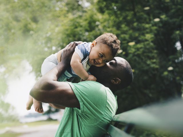 Father holding baby